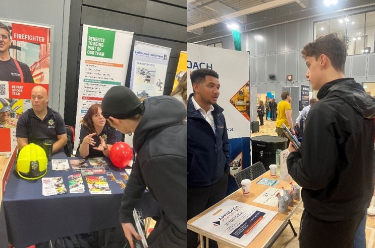 two young men with brown hair, wearing black speaking with men and women who are operating different stalls at Ashfield careers fair